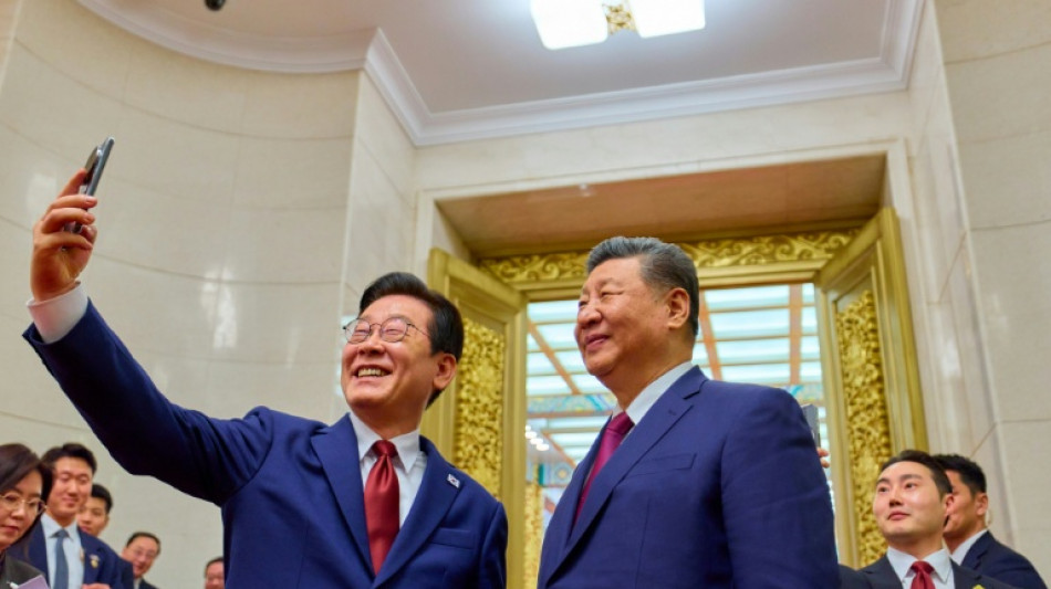 South Korea's Lee snaps Xi selfie with Chinese 'backdoor' phone
