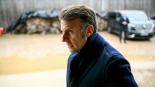 Macron says work under way to resume contact with Putin