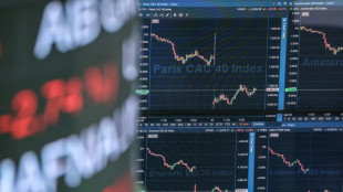 Marchés mondiaux: les inquiétudes commerciales subsistent, Wall Street termine en berne