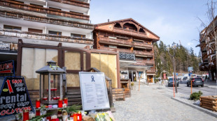 Suspect remains silent in Swiss bar fire probe