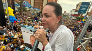 Pr&eacute;sidentielle au Venezuela: un candidat de l'opposition dans la rue, un autre sur les bulletins