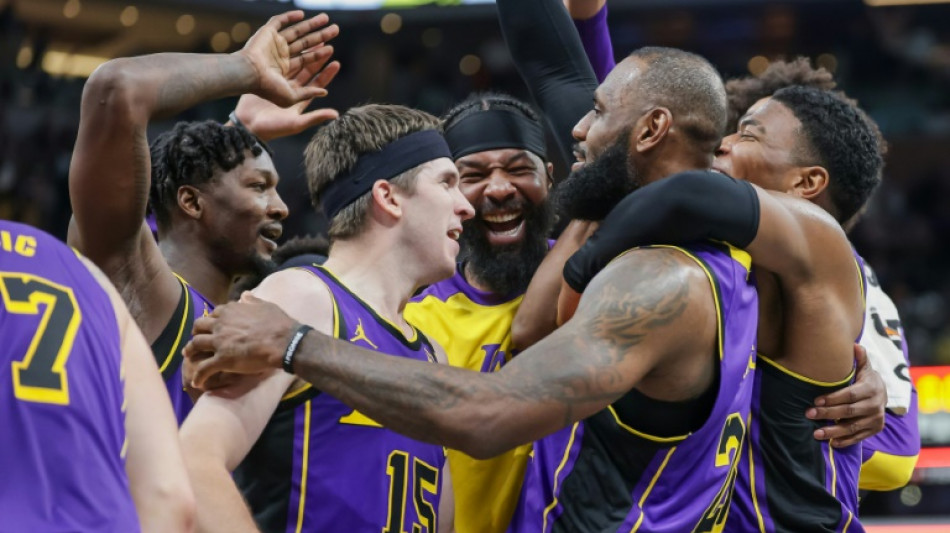LeBron buzzer-beater rescues Lakers to halt losing streak
