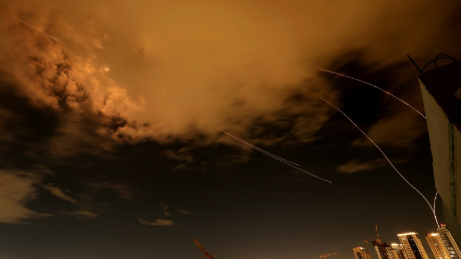 Iran hits targets across Middle East after Trump signals talks progress