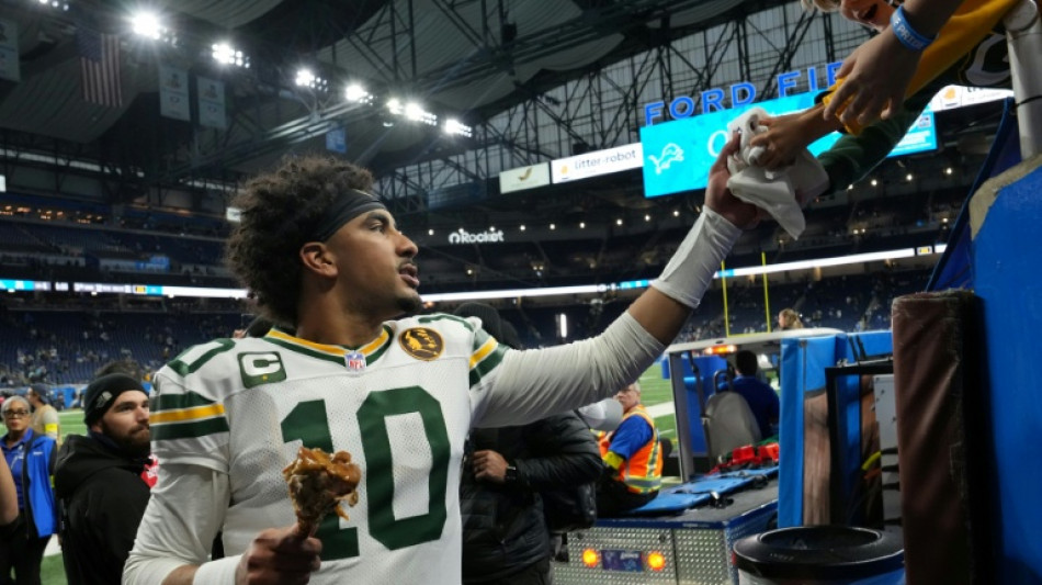 Love throws four touchdowns as Packers beat Lions