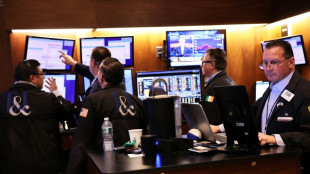 Wall Street cl&ocirc;ture en baisse, la Fed et les pr&eacute;visions des entreprises inqui&egrave;tent