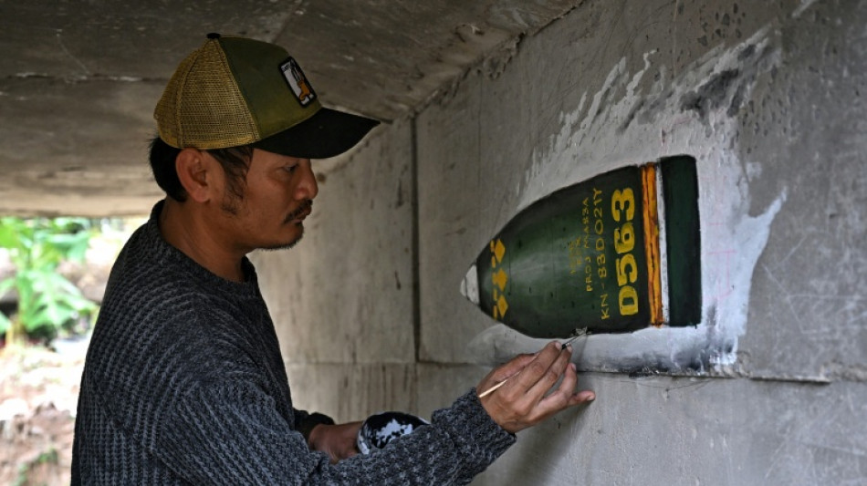 Thai teacher finds 'peace amidst chaos' painting bunker murals