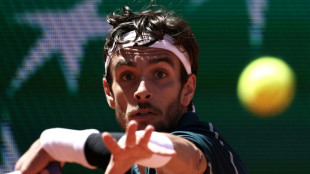 Italy's Musetti battles into French Open last 16