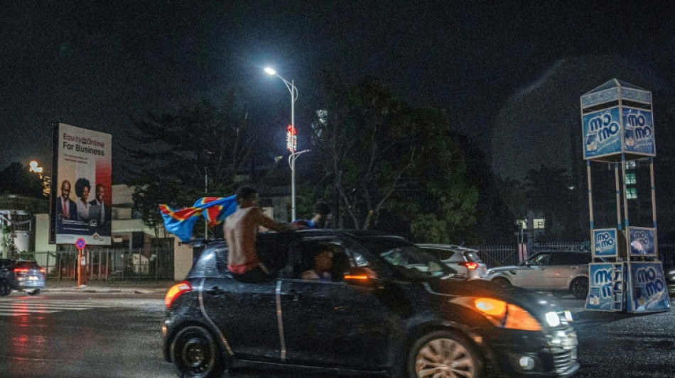 DR Congo fans dance in the rain after sealing World Cup spot