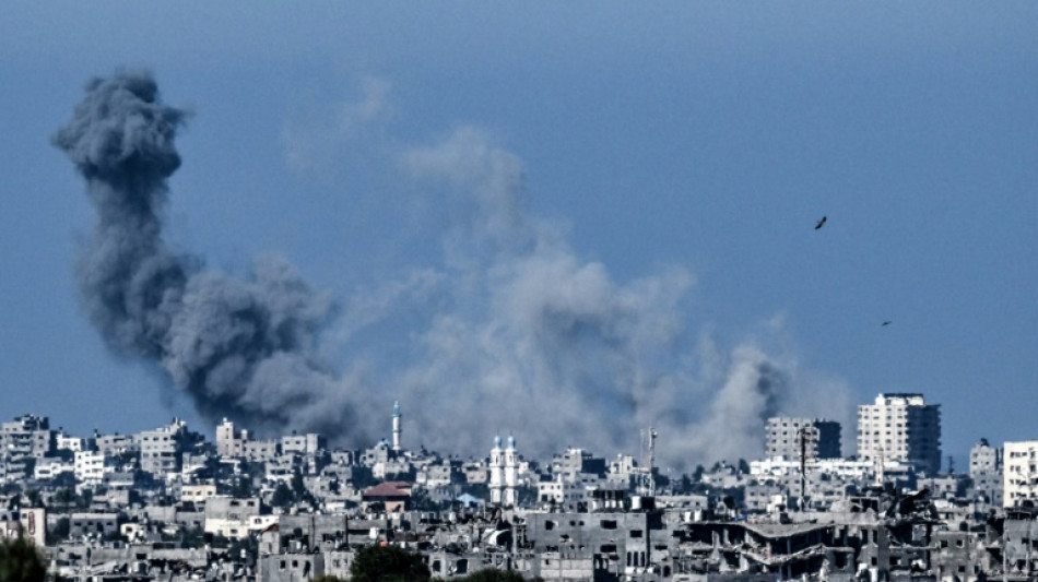 Israel steps up bombing of Gaza hours after first aid convoy enters