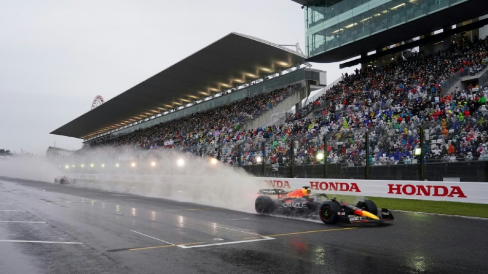 F1: le GP du Japon reprend sous la pluie apr&egrave;s deux heures d'interruption