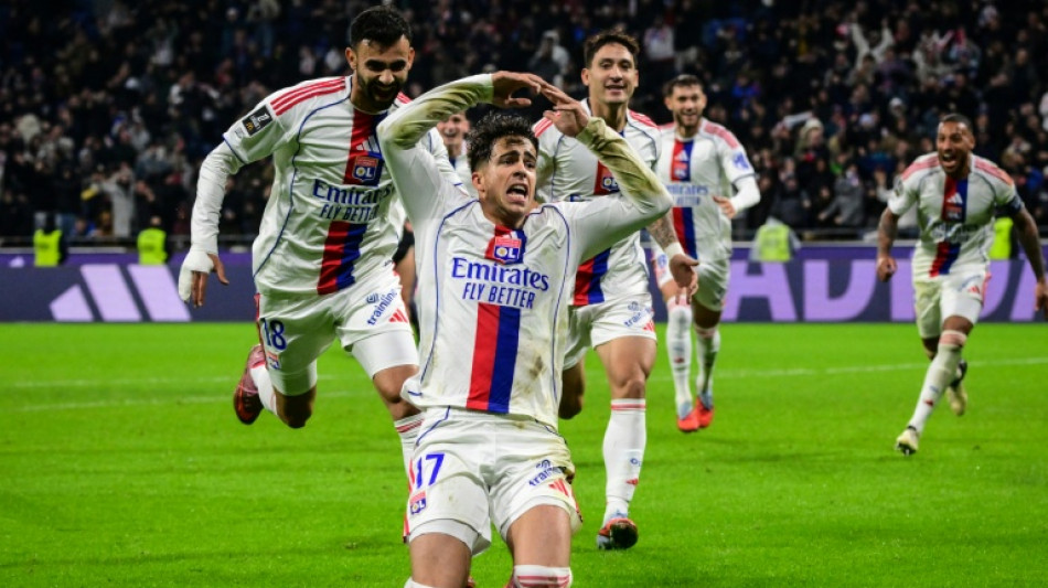 Lyon leave it late to beat 10-man Strasbourg in Ligue 1