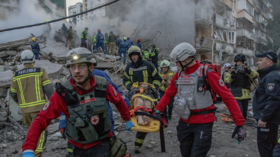 Russia pummels Kyiv, killing seven and denting peace hopes