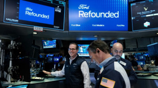 Wall Street termine en hausse, calm&eacute;e par l'absence de nouvel accident bancaire