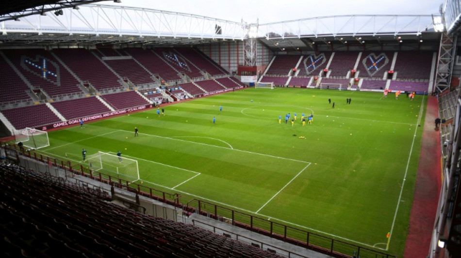 Hearts lead Old Firm as Scottish title race heads for tense finale