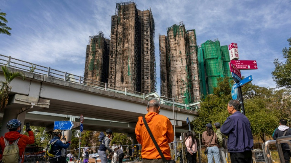 Hong Kong begins mourning period after fire kills at least 128