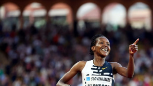 Kenya's Kipyegon sets women's mile world record, her third of season