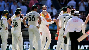 Australia four wickets from Ashes glory as England cling on