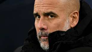 Man City boss Guardiola feeling pressure as top-four race heats up