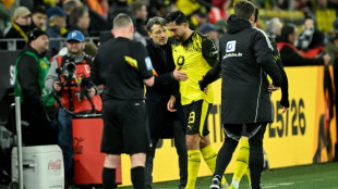 Dortmund captain Can out for season with ACL tear
