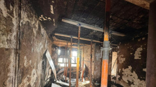 Residents return to ravaged homes months after Hong Kong fire