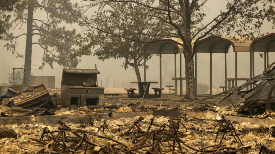 Firefighters race to protect California town threatened by wildfire
