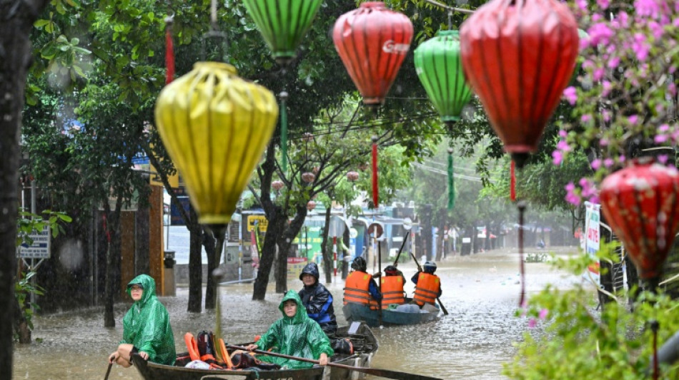 Record Vietnam floods kill 10, turn streets into canals